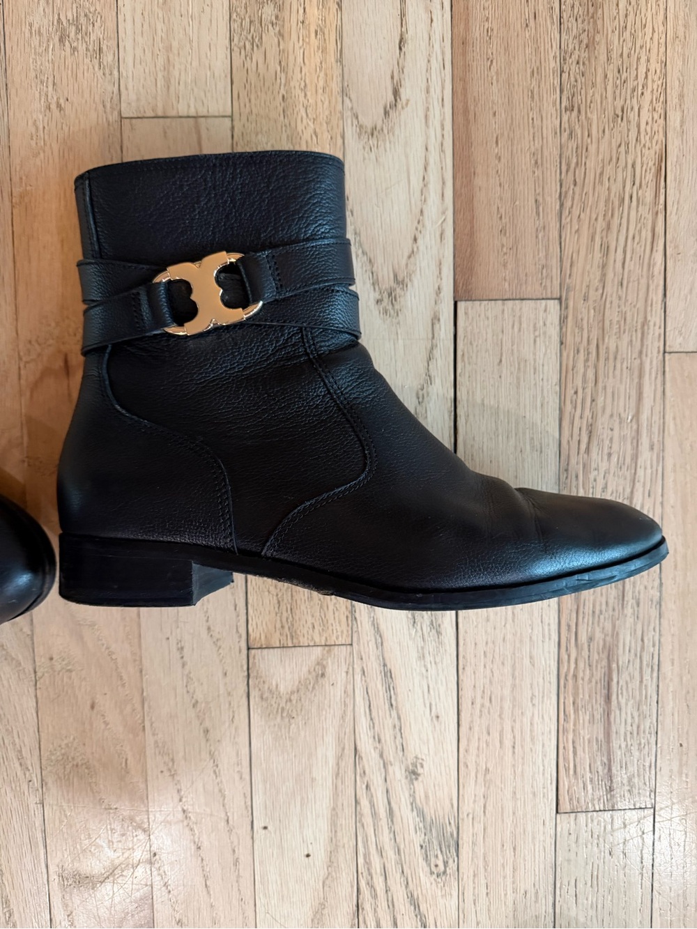Tory Burch Black Leather Ankle Boot with Gold Logo Accent